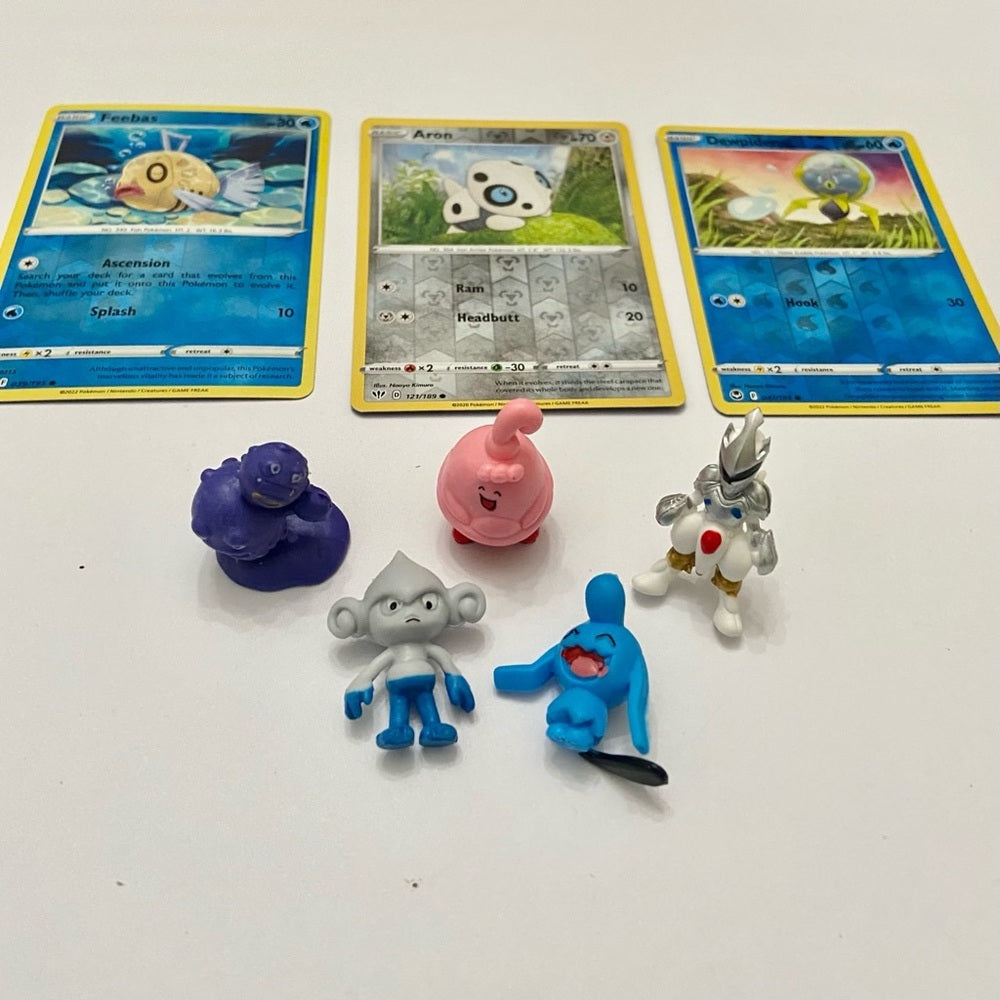 Lot (C): 3 Pokemon Reverse Holo Cards and 5 Pokemon Figures