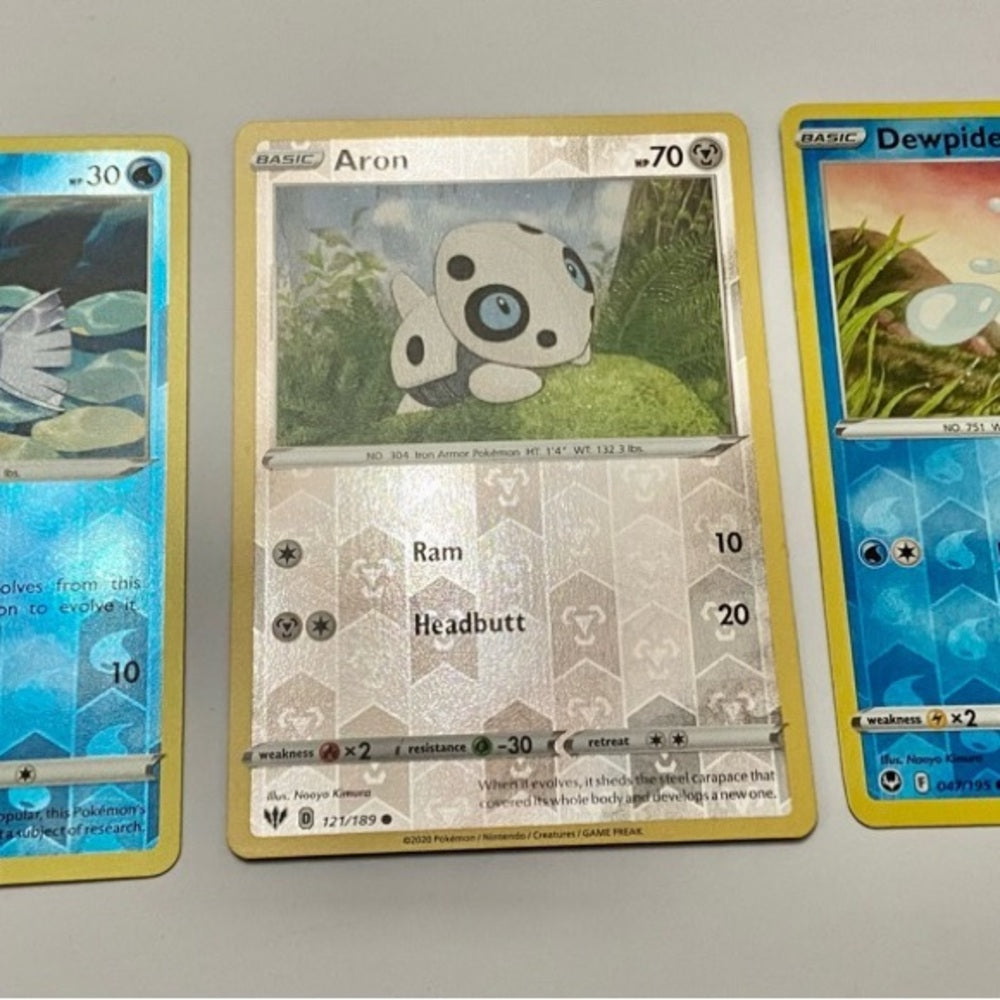 Lot (C): 3 Pokemon Reverse Holo Cards and 5 Pokemon Figures