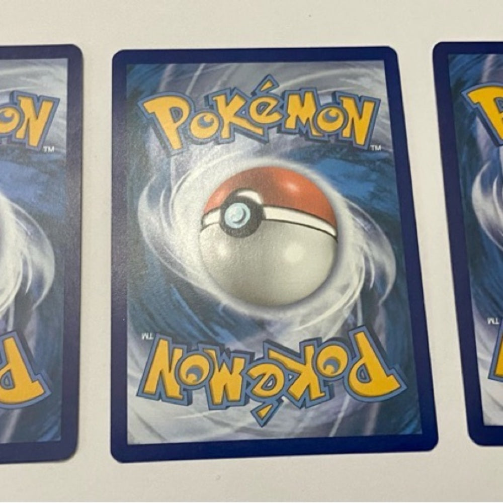 Lot (C): 3 Pokemon Reverse Holo Cards and 5 Pokemon Figures