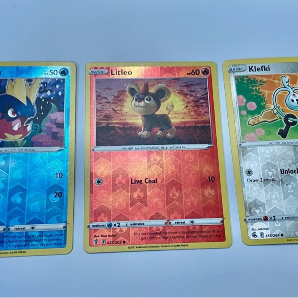 Lot (H): 3 Pokemon Reverse Holo Cards and 3 Pokemon Gold Fan Arts