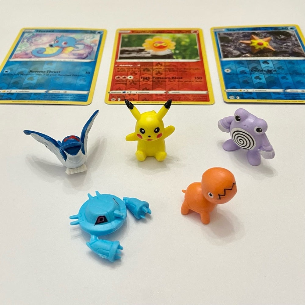 Lot (F): 3 Pokemon Reverse Holo Cards and 5 Pokemon Figures