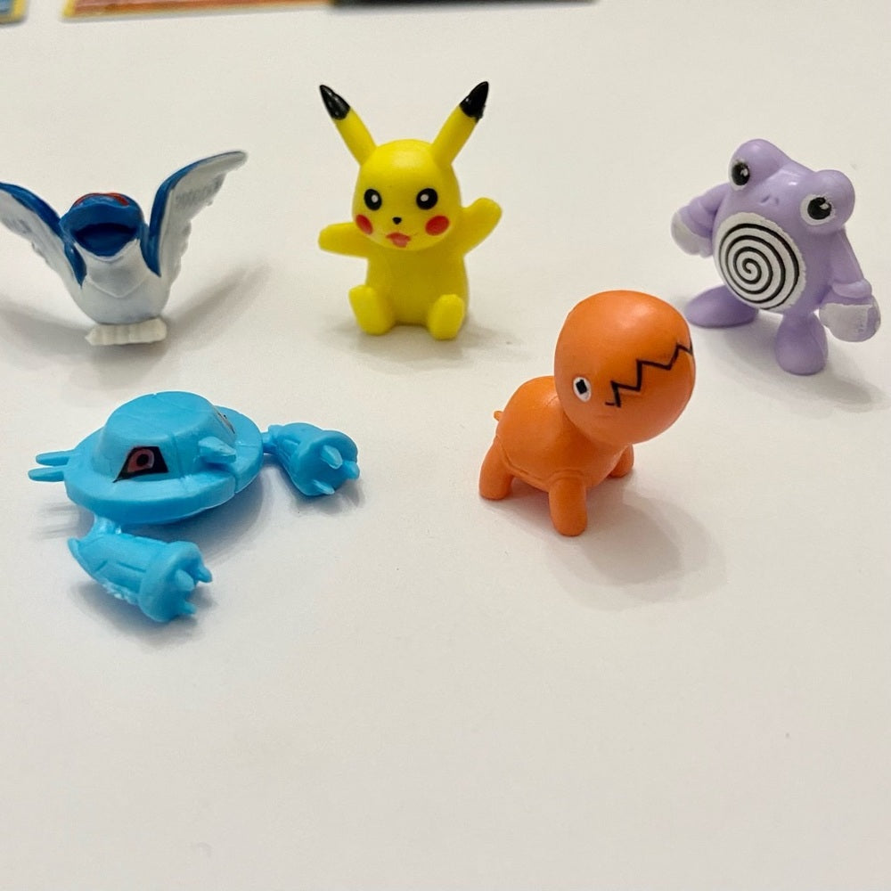 Lot (F): 3 Pokemon Reverse Holo Cards and 5 Pokemon Figures
