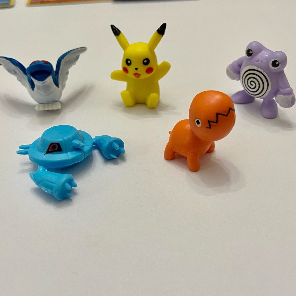 Lot (F): 3 Pokemon Reverse Holo Cards and 5 Pokemon Figures
