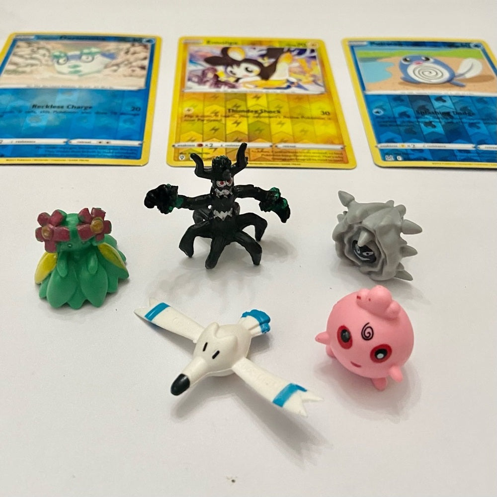 Lot (E): 3 Pokemon Reverse Holo Cards and 5 Pokemon Figures