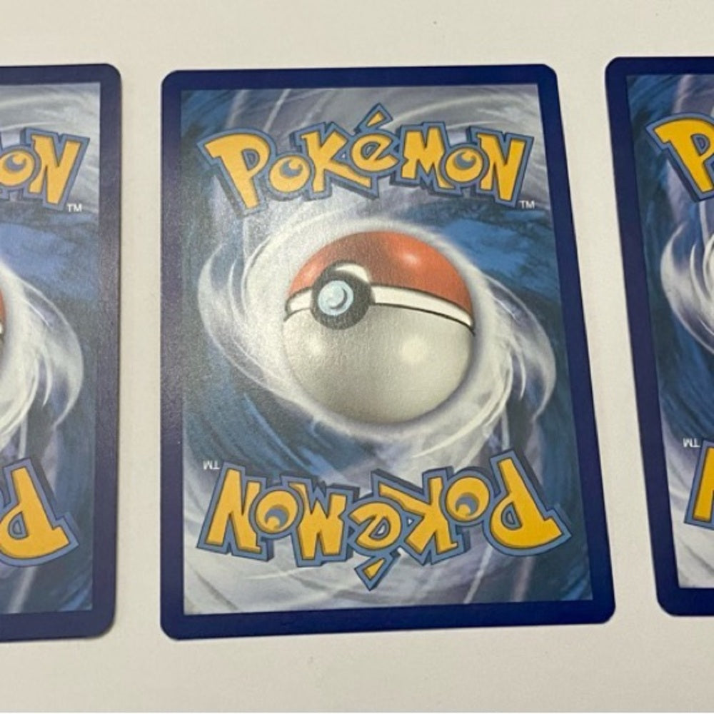 Lot (E): 3 Pokemon Reverse Holo Cards and 5 Pokemon Figures