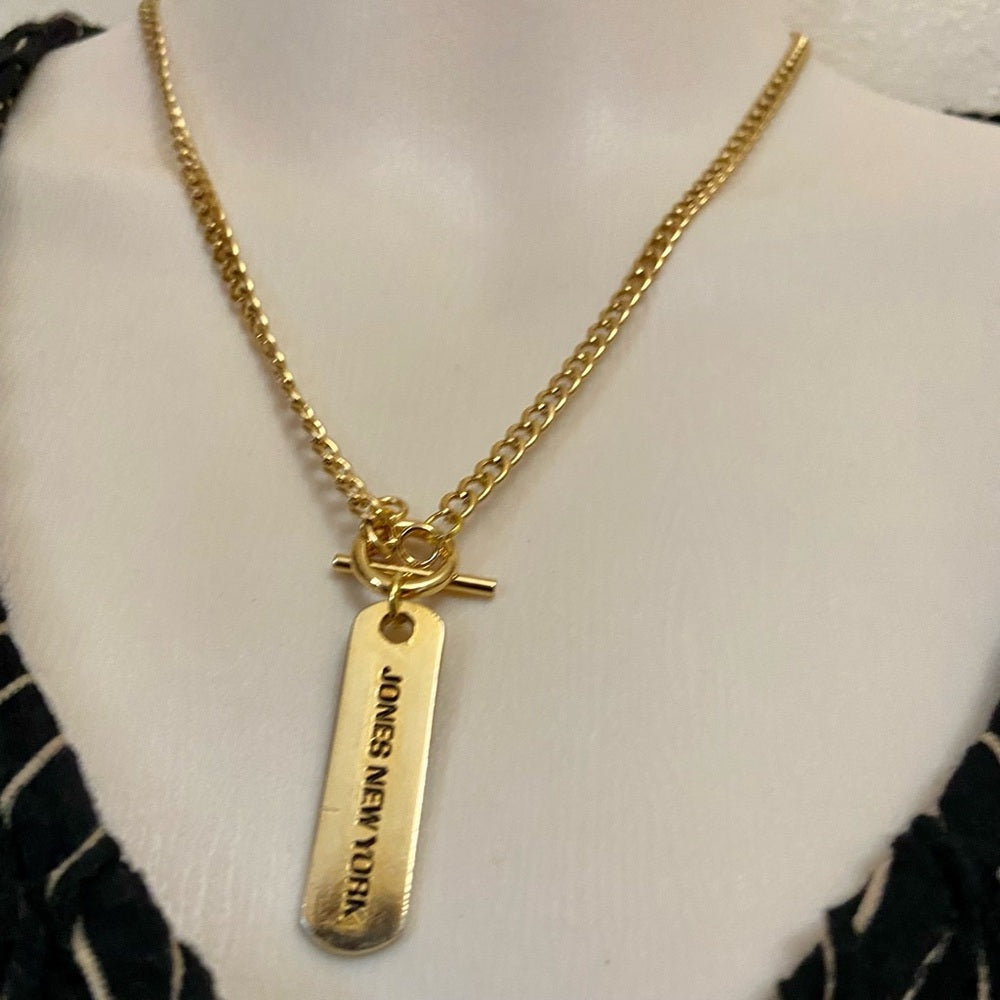 Jones of New York, 1.5in x 1/2in Tag Gold Tone Pendant Necklace