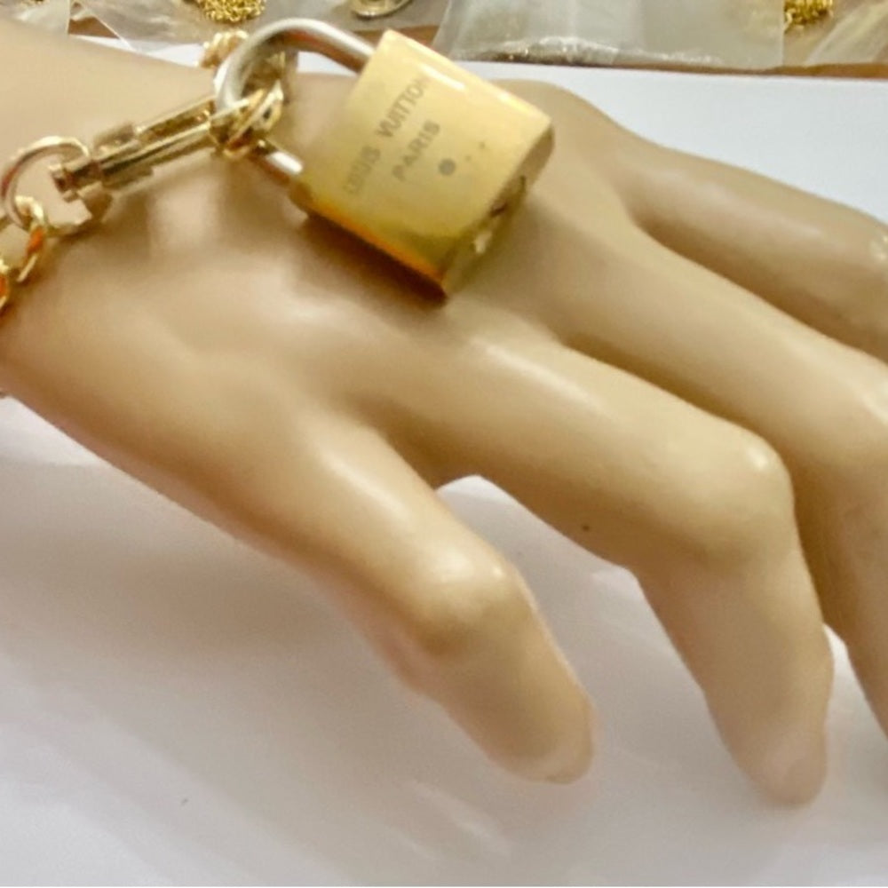 Vintage, Louis Vuitton Brass Padlock with 7-8in Gold Tone Chain Bracelet (A)