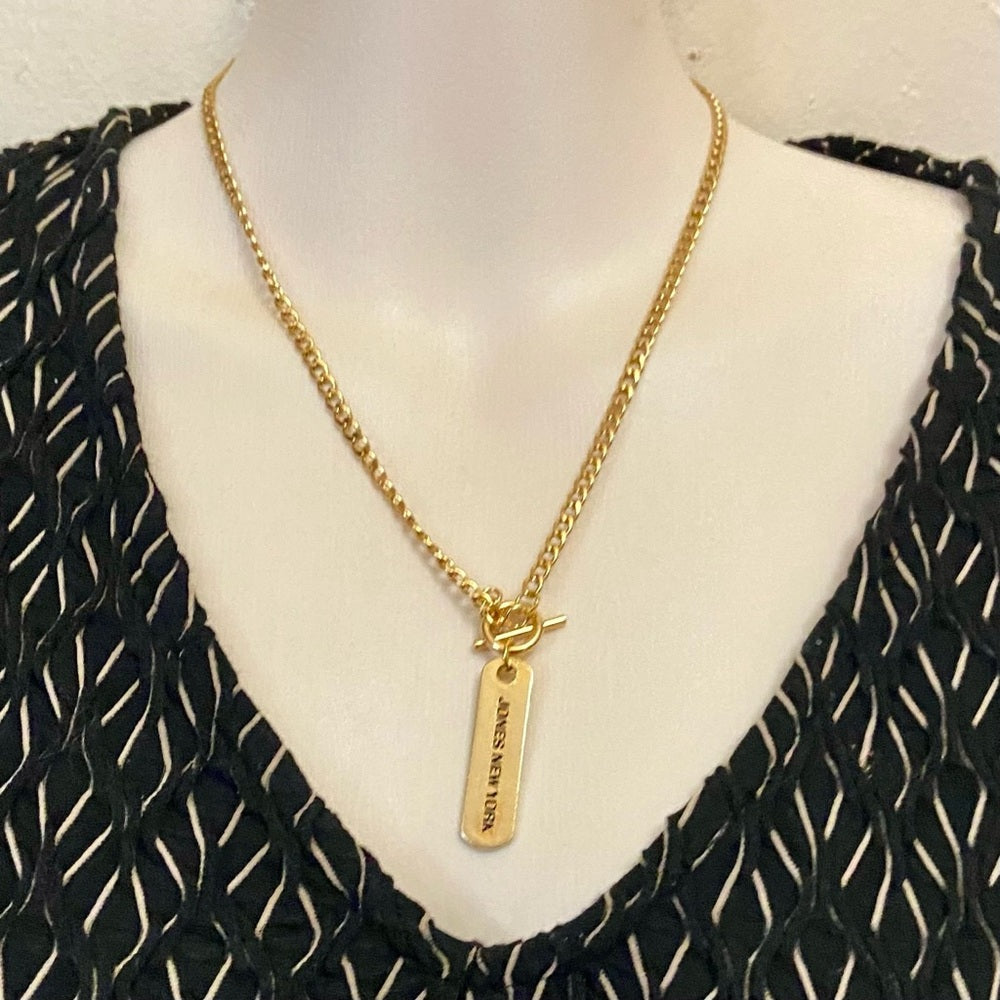 Jones of New York,  1.5in x 1/2in Tag Gold Tone Pendant Necklace