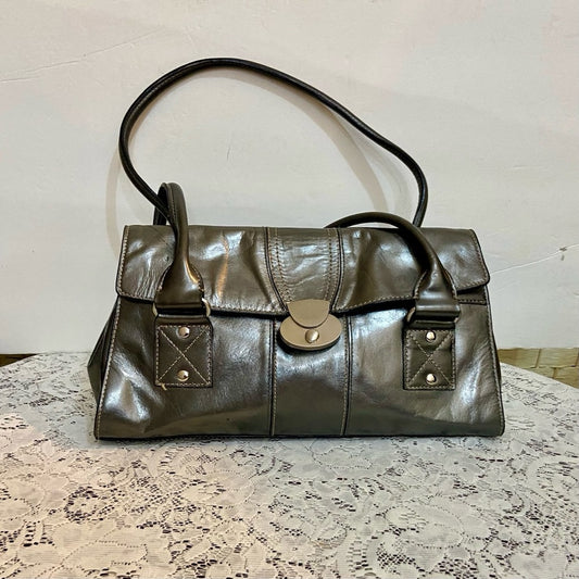 East 5th Metallic Silver Faux Leather Handbag. (13.5in x 7.5in x 3.5in)