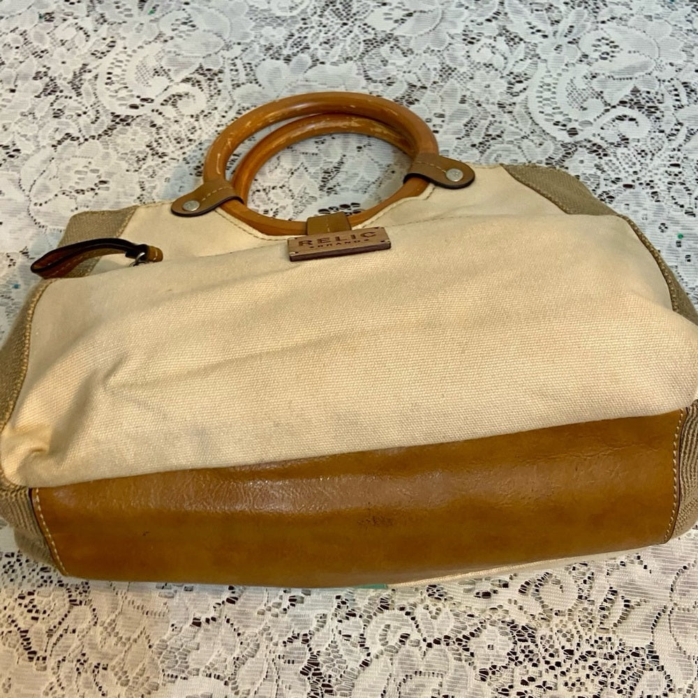 Relic Floral Beige Handbag with Tan Leather  Trim (11in x 8.5in x 4in)