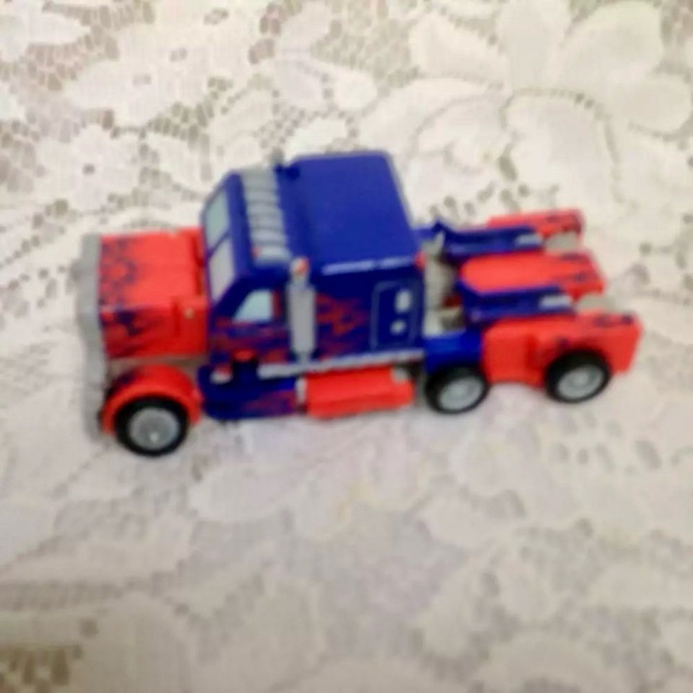 Red Van Transformer by Hasbro, Inc. 4in x 2.5 in (#08)