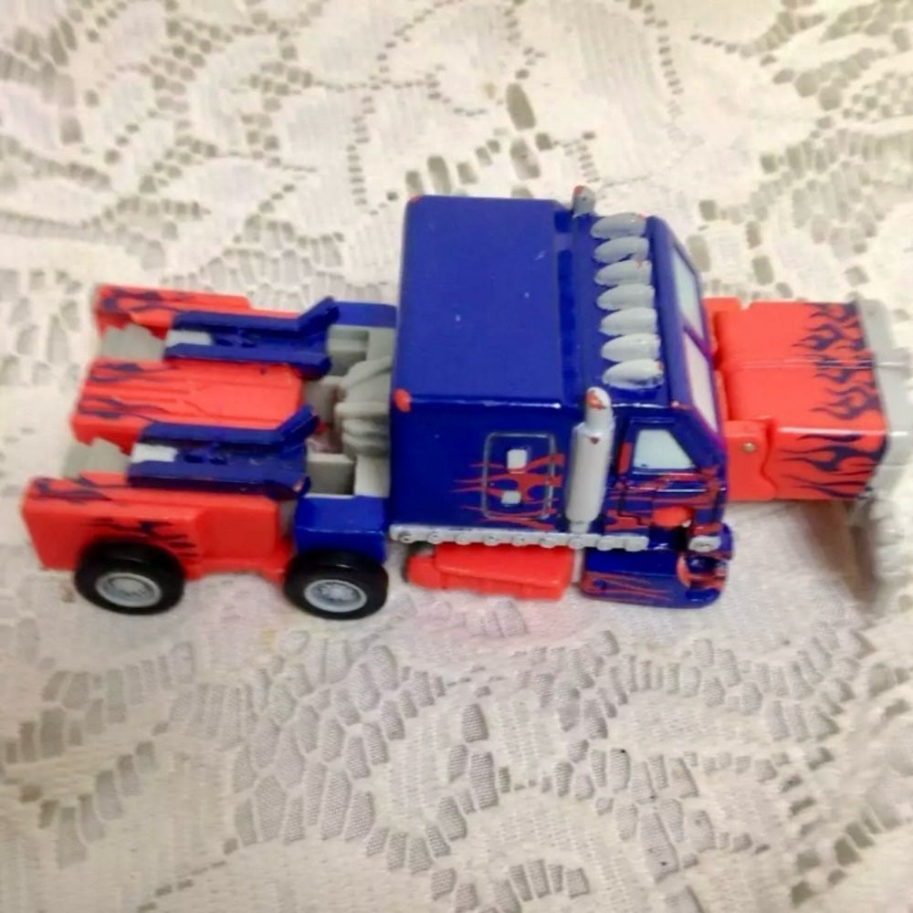 Red Van Transformer by Hasbro, Inc. 4in x 2.5 in (#08)