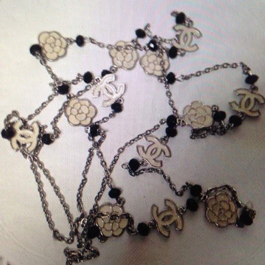 Elegant Black and White Camelia Enamel Necklace