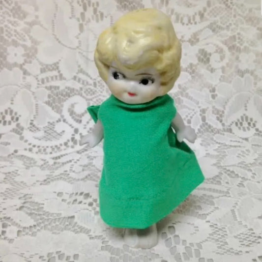 Antique, Made in Japan, 5.25in Bisque, Googly-eyed Doll in Green Dress