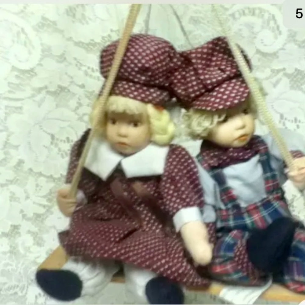 Beautiful, 9-inch, Boy And Girl Dolls on a Swing