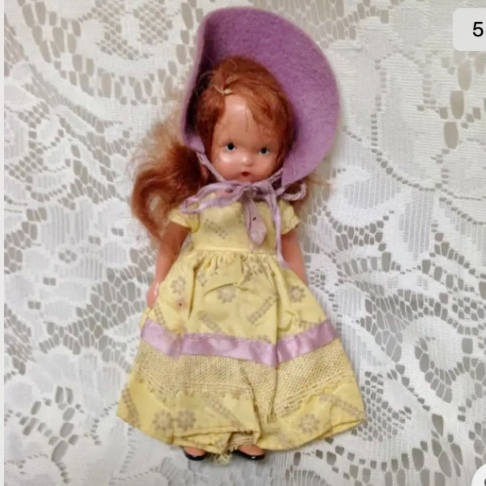 Vintage, 1930s 5.5in Nancy Ann Story Book Bisque Doll- Yellow Dress n Purple Hat