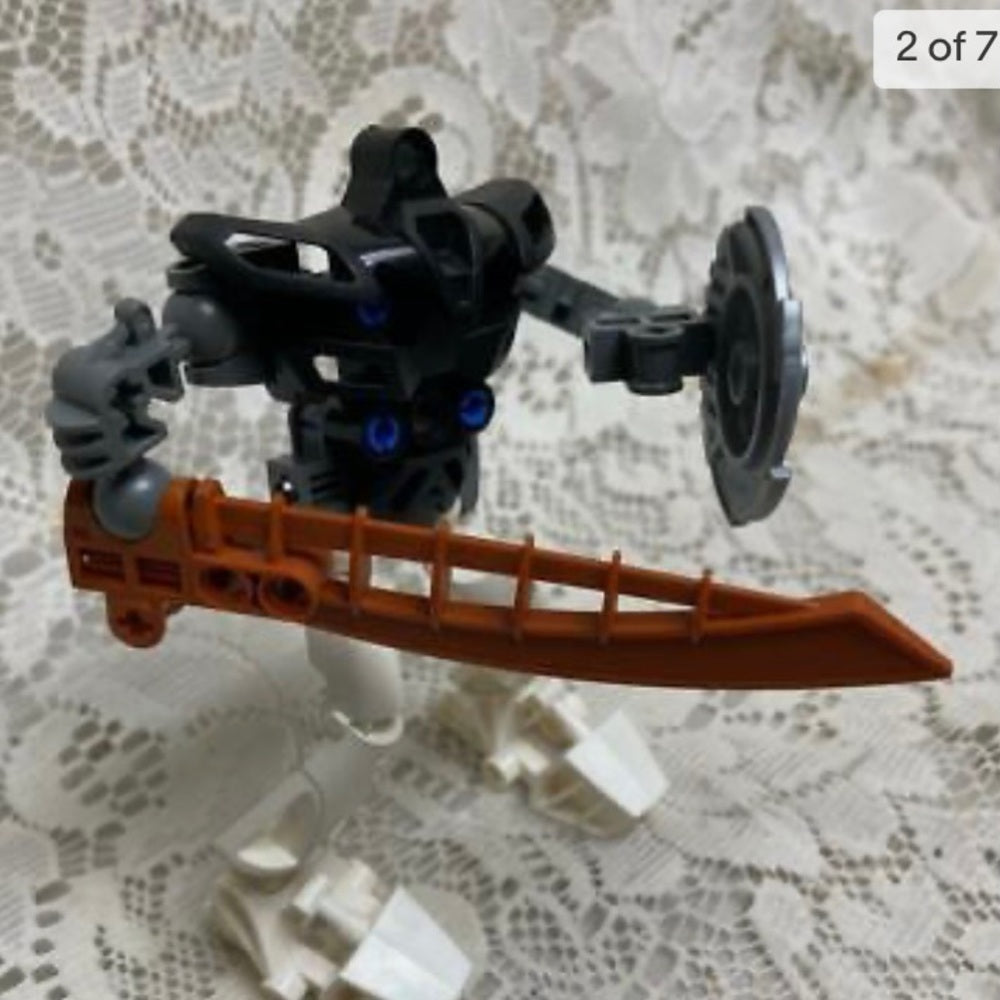 Vintage, Rare, Lego, Bionicle Action Figure with Sword and Shield 5in x 5in (B02