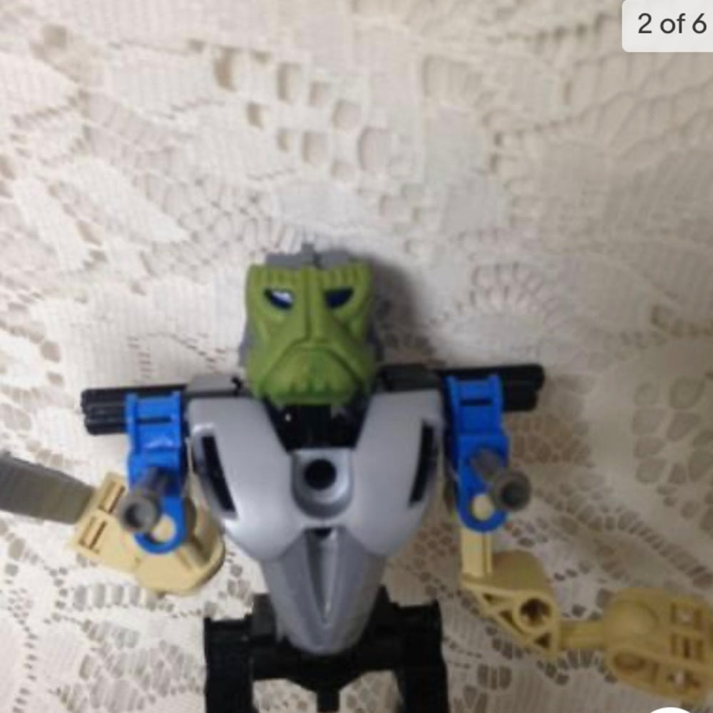 Vintage, Rare, Lego, Bionicle Green Head Action Figure  8in x 6.5in x 2.25in