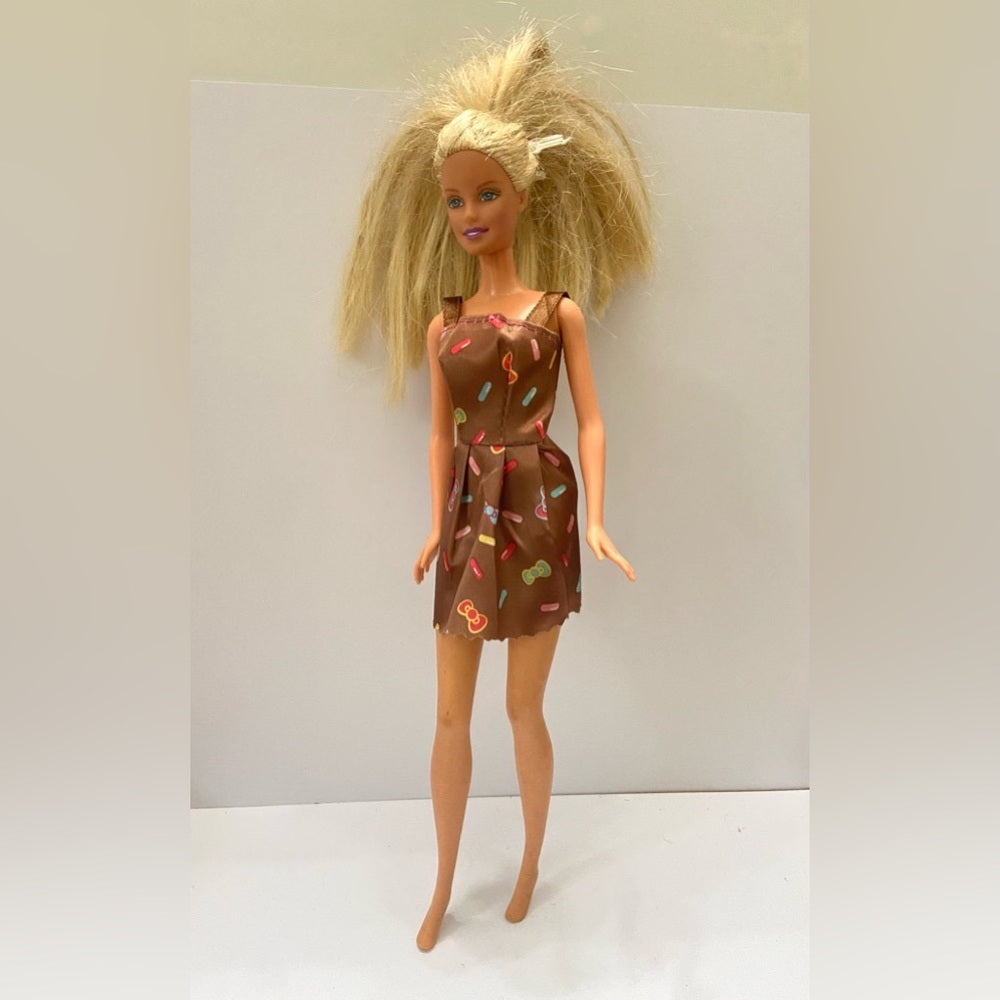 Vintage, 1999 Barbie Doll in Brown Printed Mini Dress