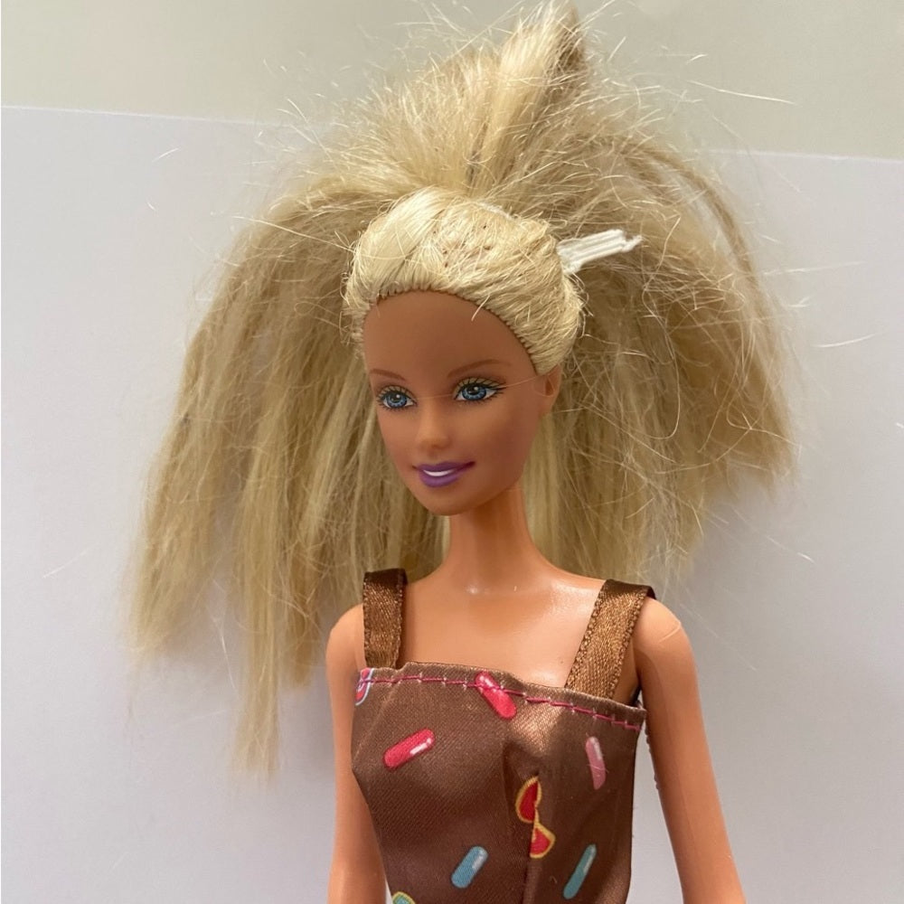 Vintage, 1999 Barbie Doll in Brown Printed Mini Dress