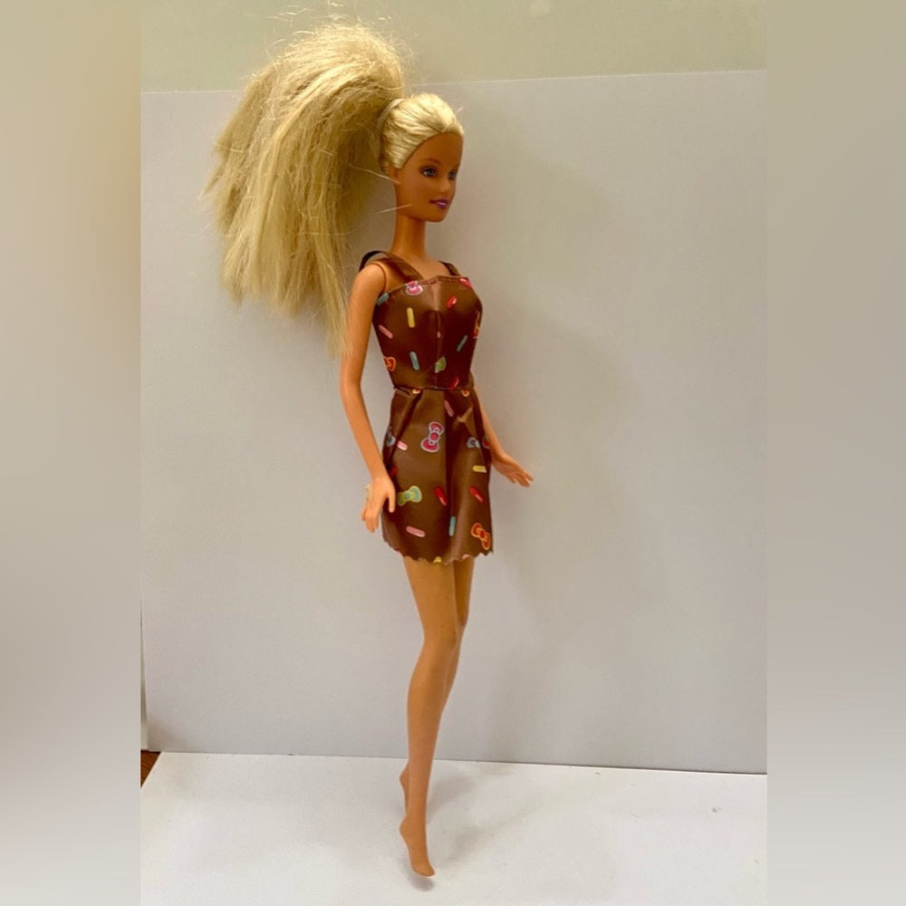 Vintage, 1999 Barbie Doll in Brown Printed Mini Dress
