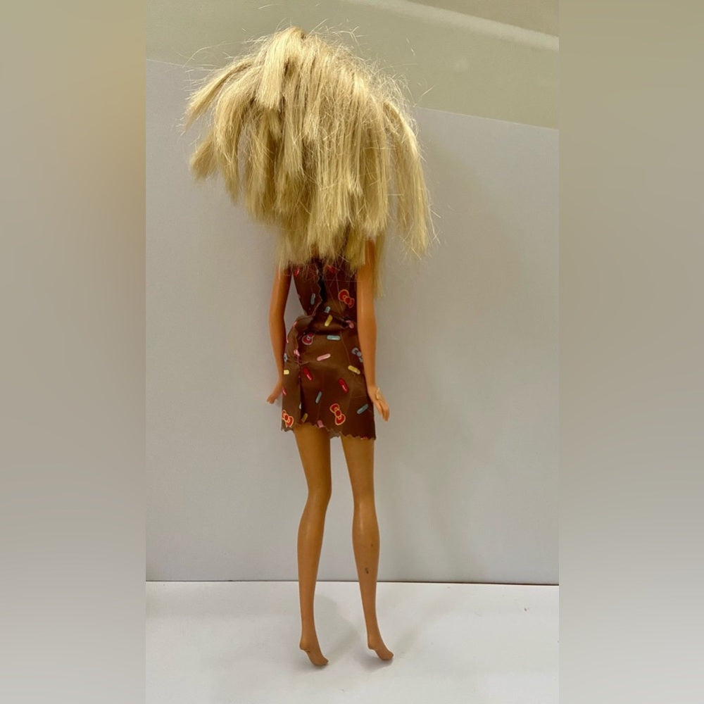 Vintage, 1999 Barbie Doll in Brown Printed Mini Dress