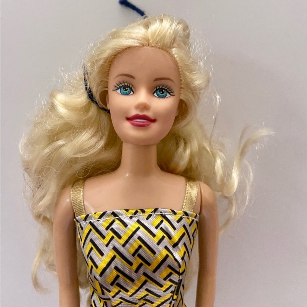Vintage, 1990s Barbie Doll in Silver and Gold Mini Dress