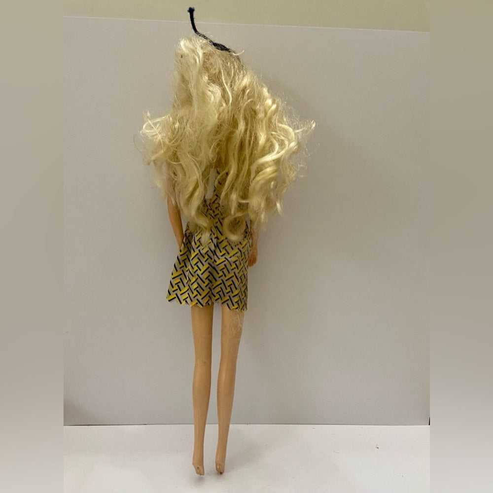Vintage, 1990s Barbie Doll in Silver and Gold Mini Dress