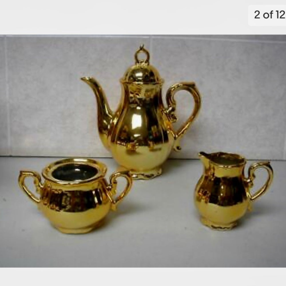Vintage,  Made in Japan, 12-pc Musical-Gilded Ceramic Tea Set (sftz)  This is a