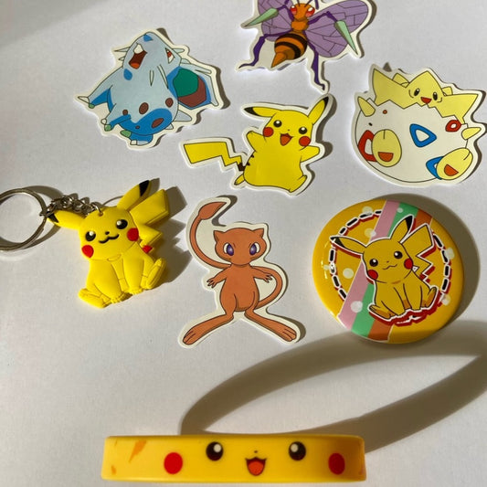 Lot of 8pc Pokemon Collectibles. (A)