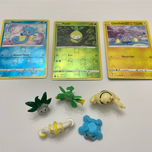 Lot (A): 3 Pokemon Reverse Holo Cards and 5 Pokemon Figures