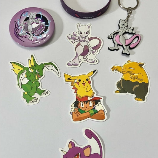 Lot of 8pc Pokemon Collectibles. (B)