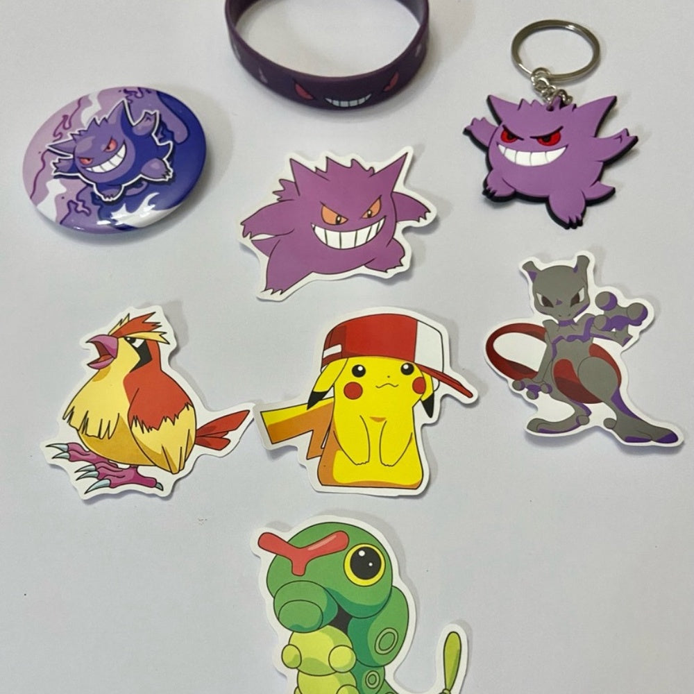 Lot of 8pc Pokemon Collectibles. (G)