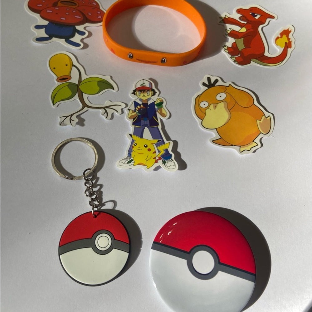Lot of 8pc Pokemon Collectibles. (J)