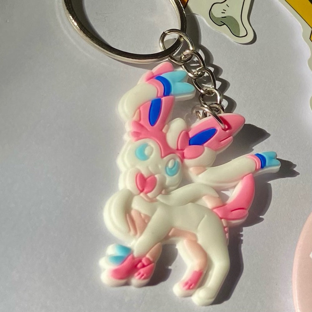 Lot of 8pc Pokemon Collectibles. (H)