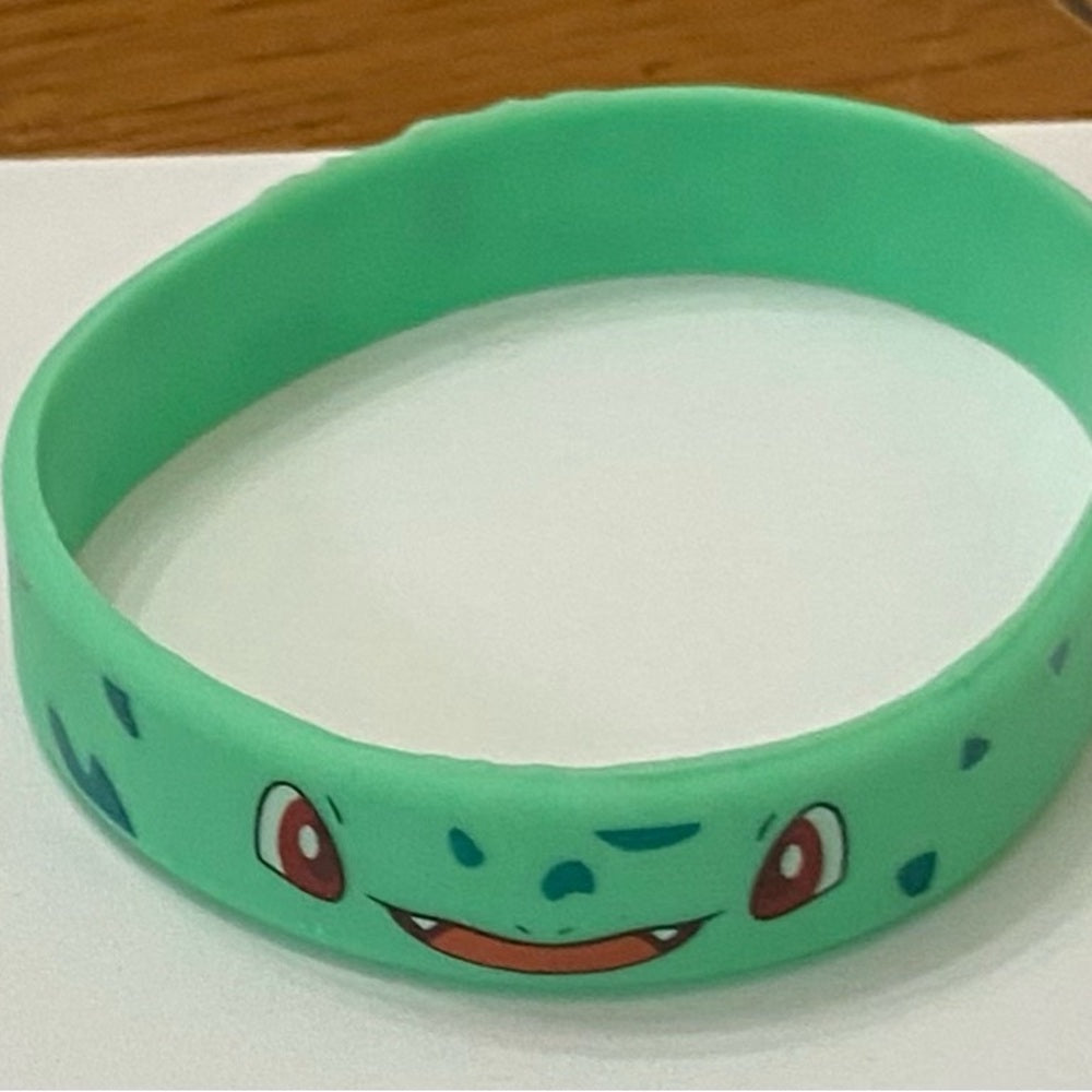 Lot of 8pc Pokemon Collectibles. (H)