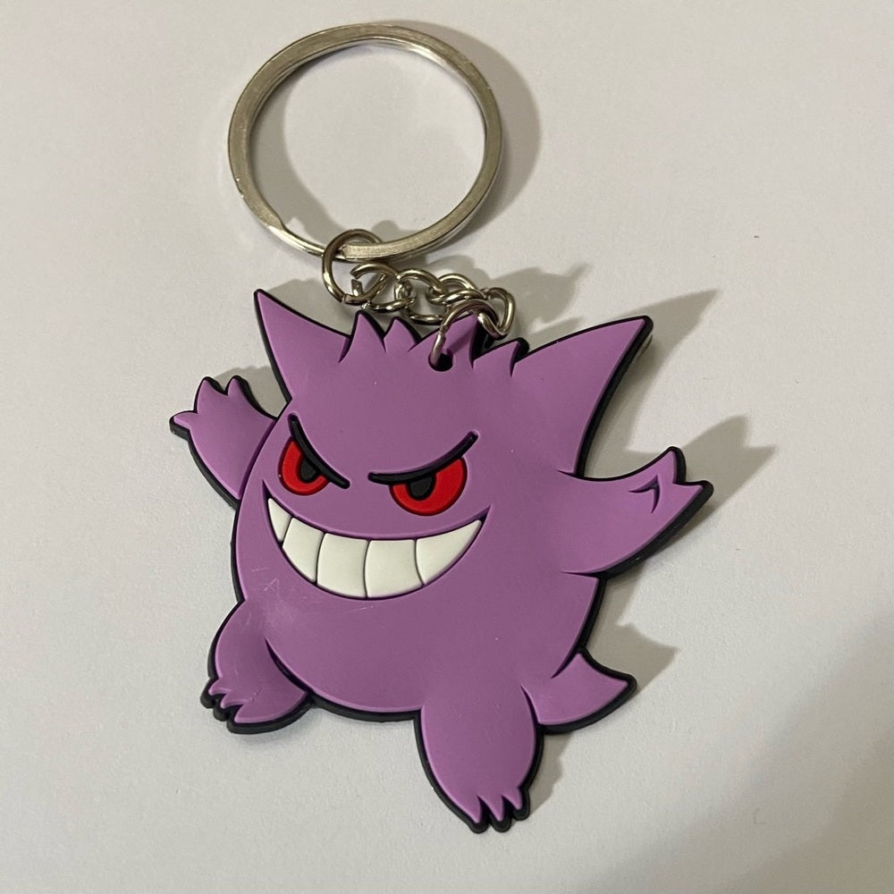 Lot of 8pc Pokemon Collectibles. (G)