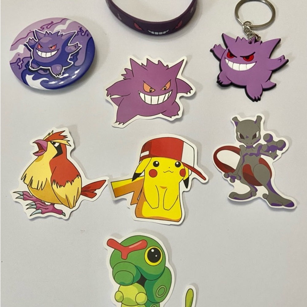 Lot of 8pc Pokemon Collectibles. (G)