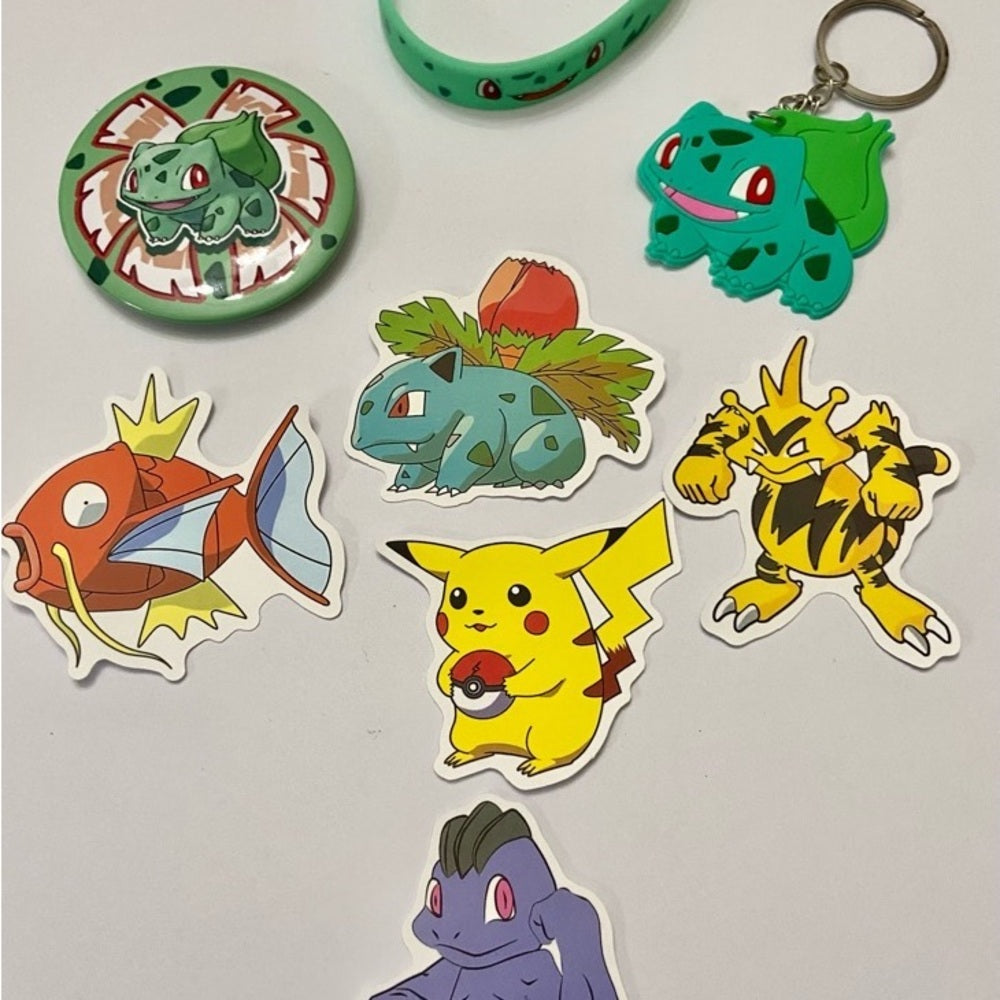 Lot of 8pc Pokemon Collectibles. (D)