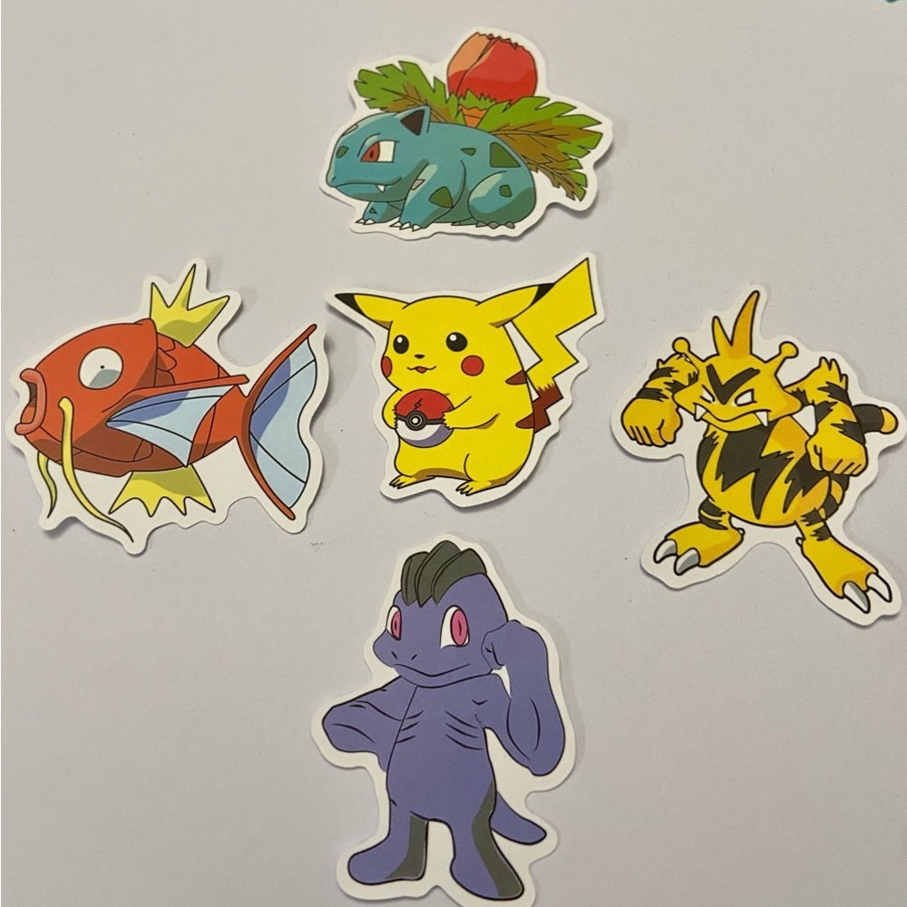 Lot of 8pc Pokemon Collectibles. (D)