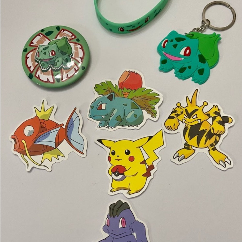 Lot of 8pc Pokemon Collectibles. (D)