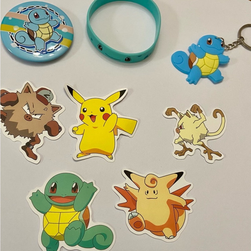 Lot of 8pc Pokemon Collectibles. (F)