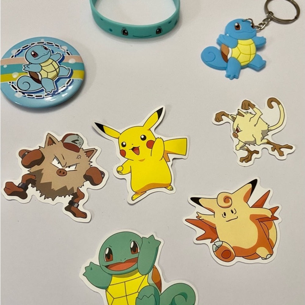 Lot of 8pc Pokemon Collectibles. (F)